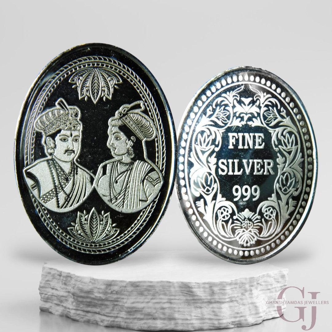 Silver Coin 24KT Purity Oval Shape Front side Raja Rani - Backside Fine Silver - Ghanshyamdas Jewellers