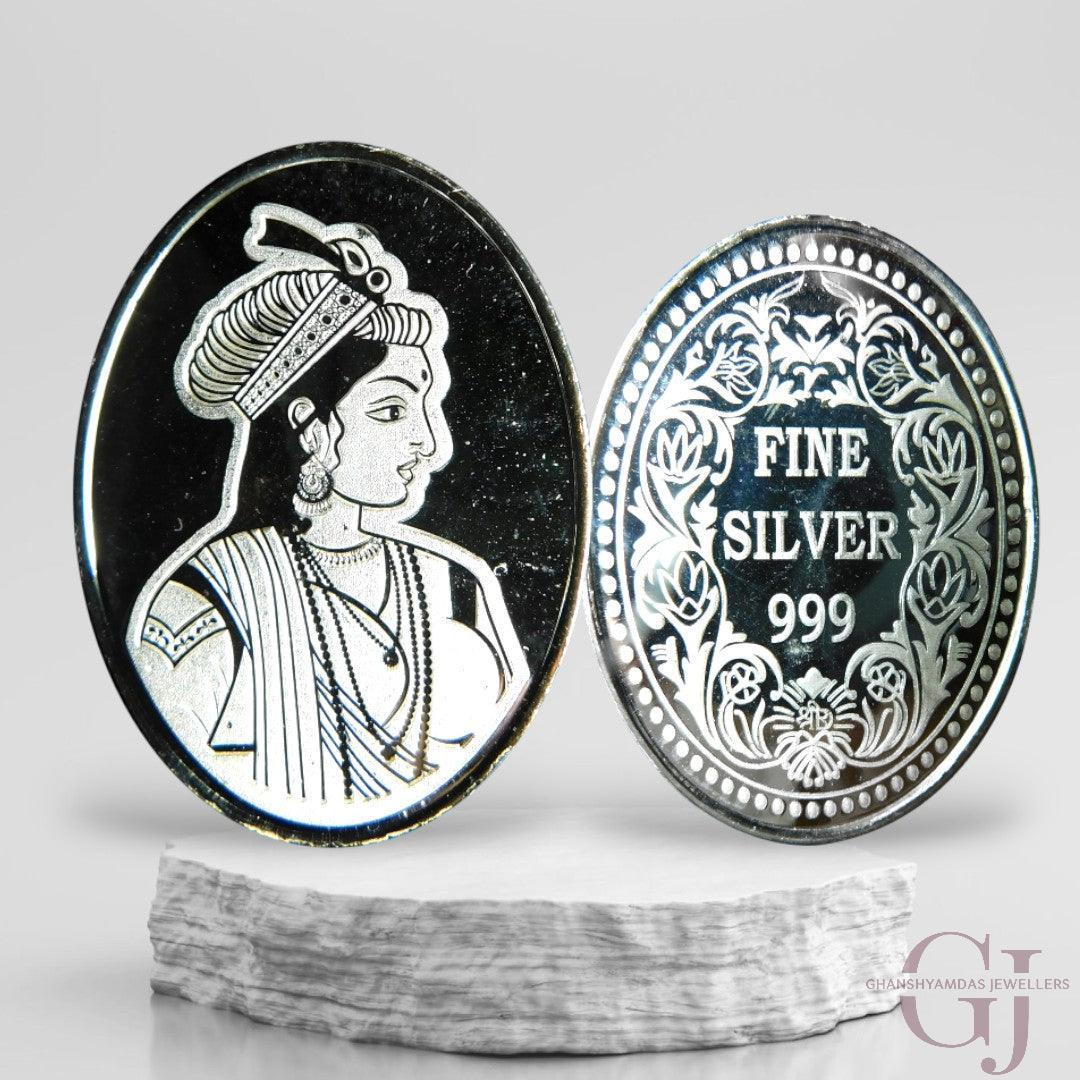 Silver Coin 24KT Purity Oval Shape Front side Raja Rani - Backside Fine Silver - Ghanshyamdas Jewellers