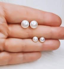 combination of white pearls earrings - Ghanshyamdas Jewellers