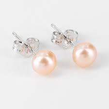 shinny charming look of peech pearl earrings - Ghanshyamdas Jewellers