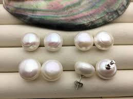 Shiny look of white pearl earrings - Ghanshyamdas Jewellers